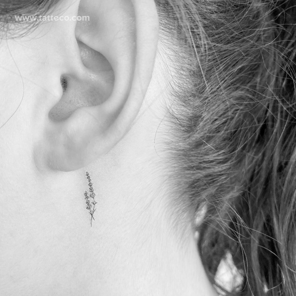 aries symbol tattoo behind ear
