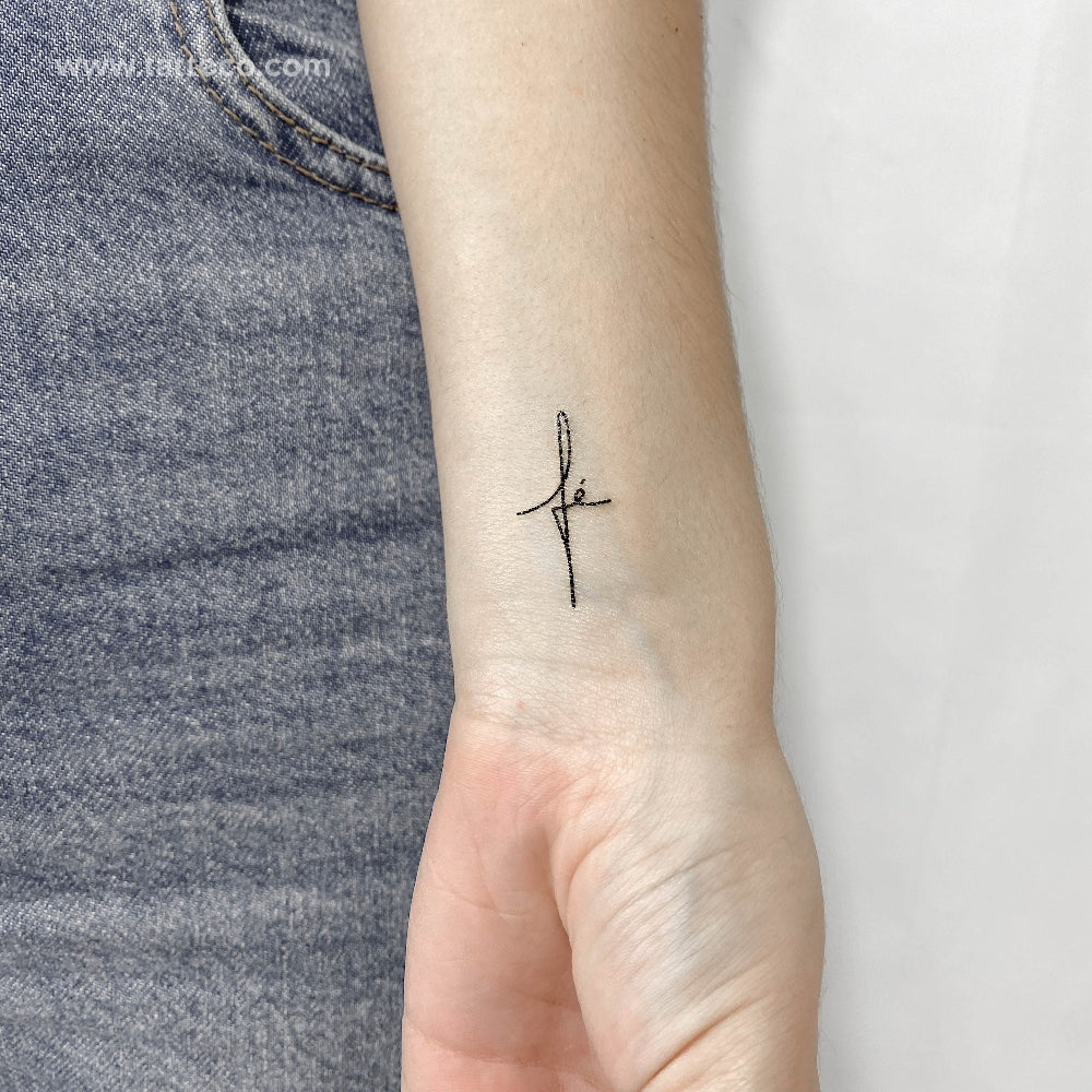 cross tattoo forearm