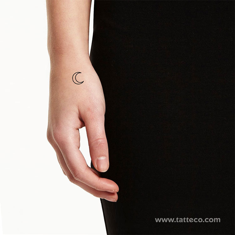 crescent moon tattoo finger