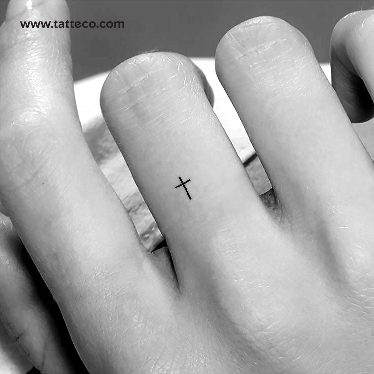 white cross tattoos on wrist